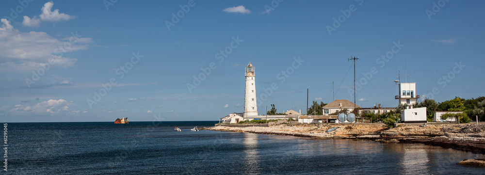 lighthouse in the sea bay