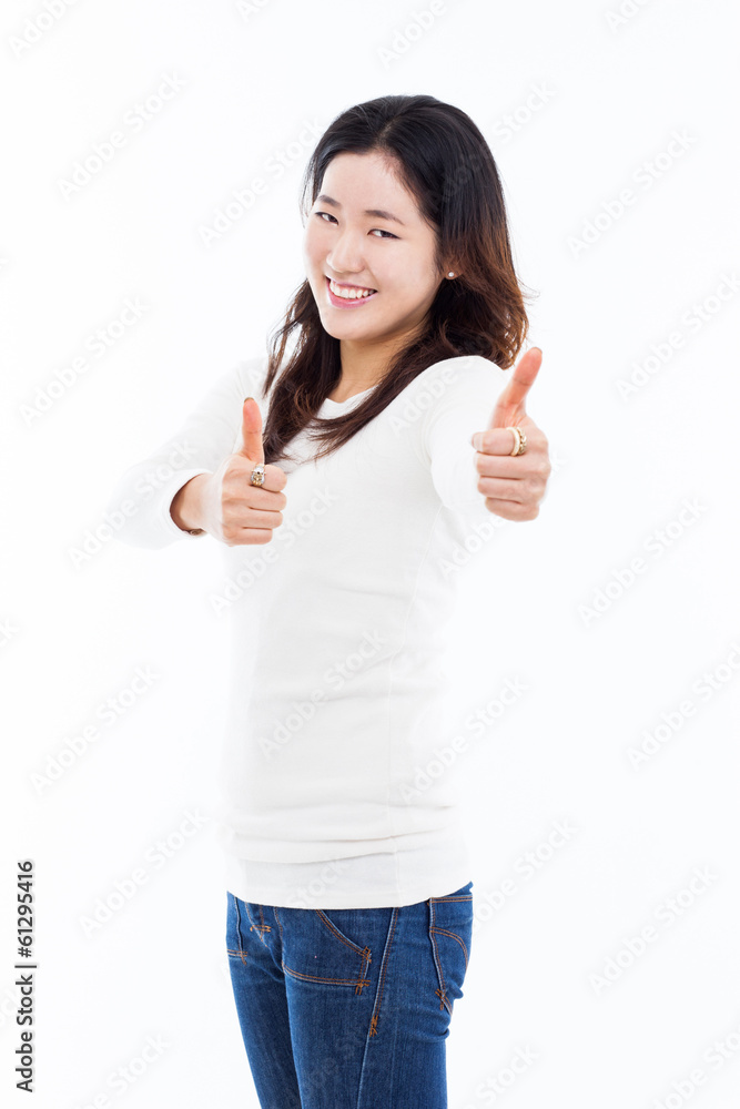 Young Asian woman showing thumb. Young Asian woman showing thumb.