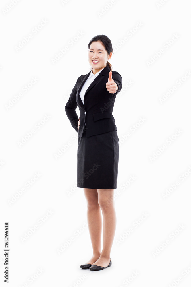 Successful happy Asian businesswoman showing thumb. Successful happy Asian businesswoman showing thumb.