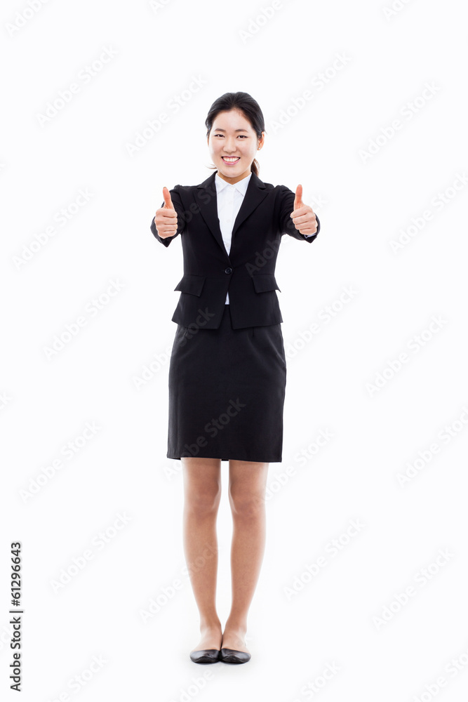 Successful happy Asian businesswoman showing thumb. Successful happy Asian businesswoman showing thumb.