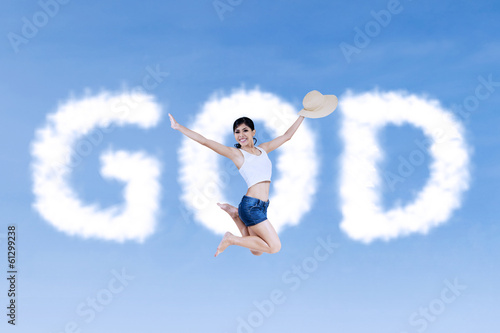 Active religious woman jumping © Creativa Images