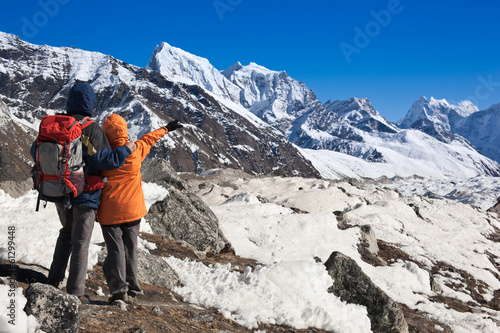 Tourists discuss trekking route in Gokio valley. Nepal photo
