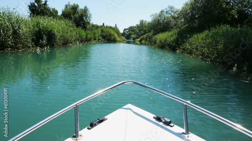 Driving a boat in a river