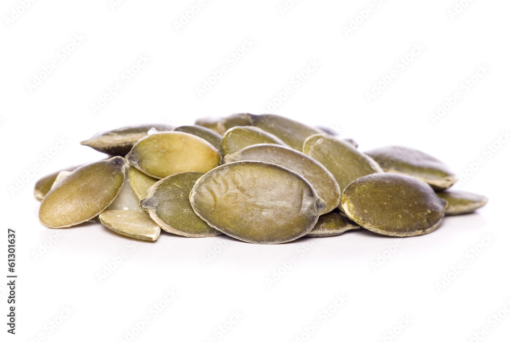 pile of pumpkin seeds pile of pumpkin seeds