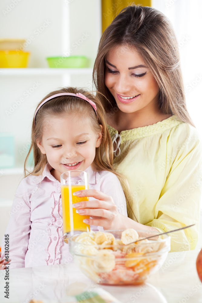 Mother and daughter in the kitchen Mother and daughter in the kitchen
