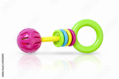Fotografi Colorful rattle baby toy isolated on white