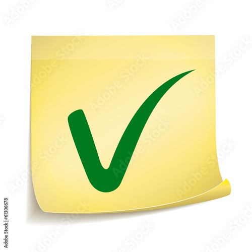 Yellow stick note paper with green check mark