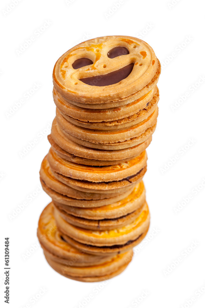 Stack of round cookies with smile isolated