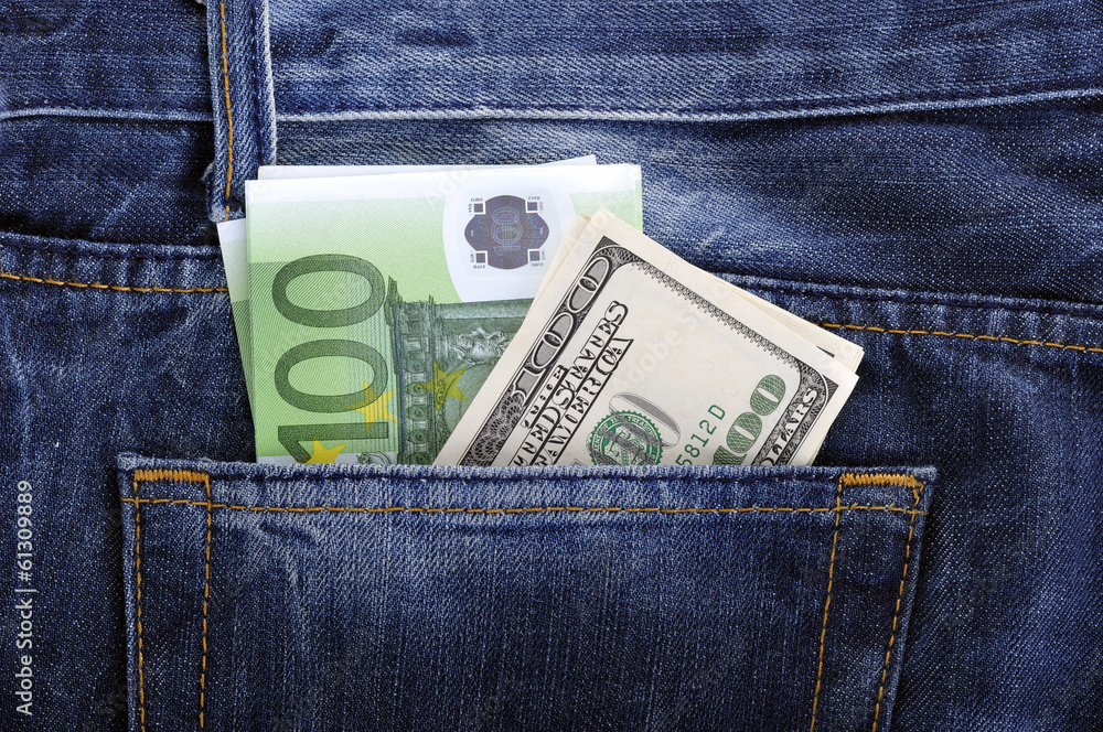 U.S. dollars and EURO in the back jeans pocket U.S. dollars and EURO in the back jeans pocket