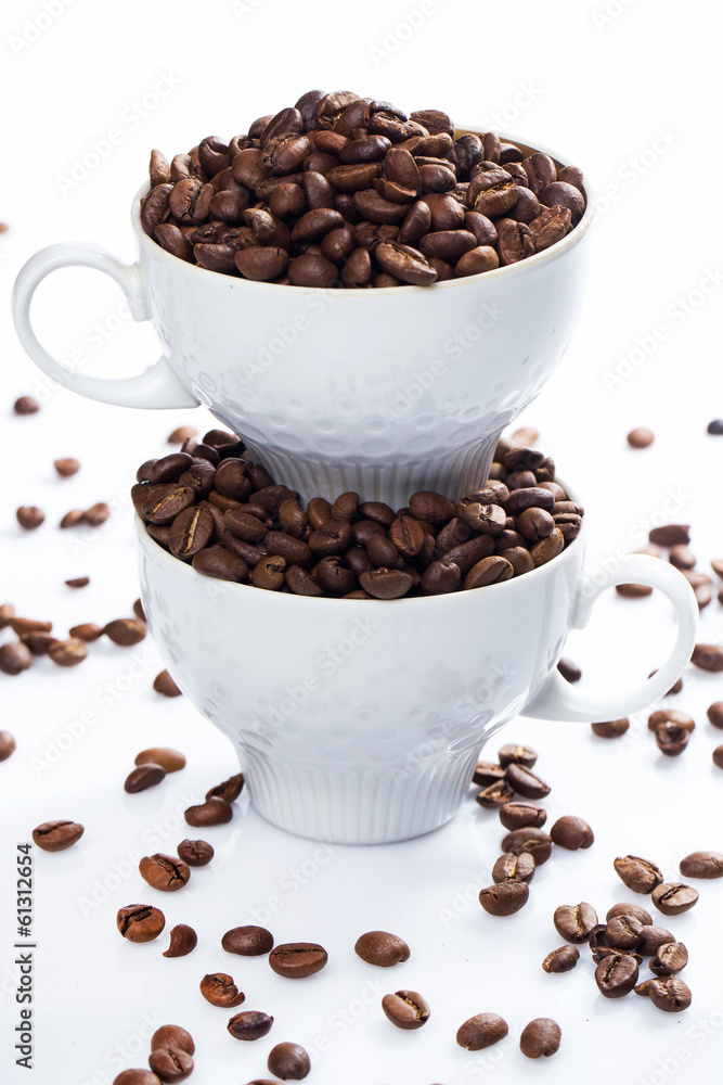Coffee beans and cups Coffee beans and cups