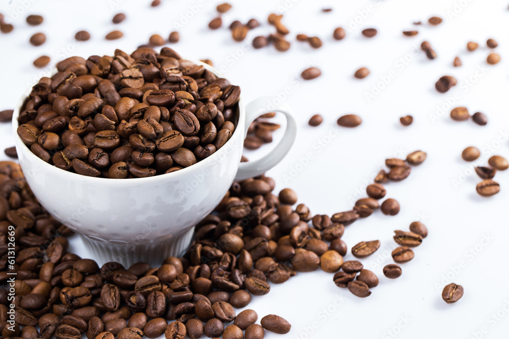 Coffee beans and cups Coffee beans and cups