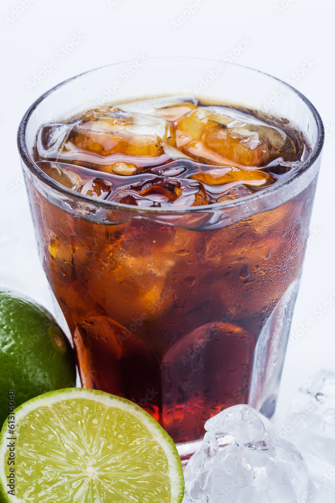 Fresh cocktail with cola drink and lime Fresh cocktail with cola drink and lime