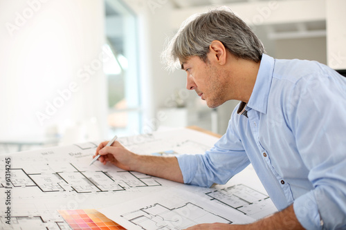 Architect designing house for client