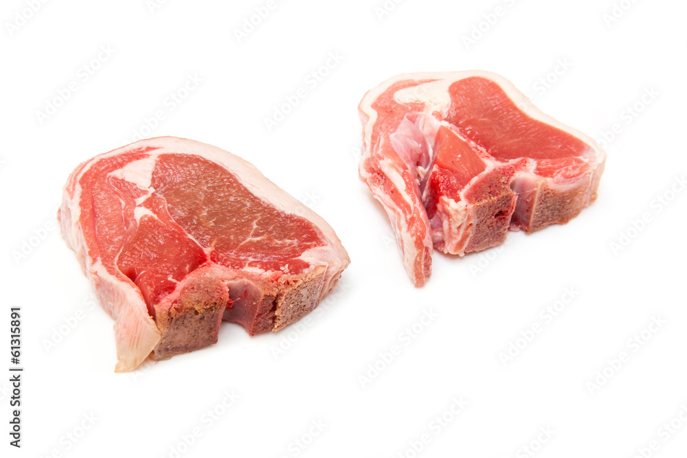 lamb chops isolated on a white studio background.