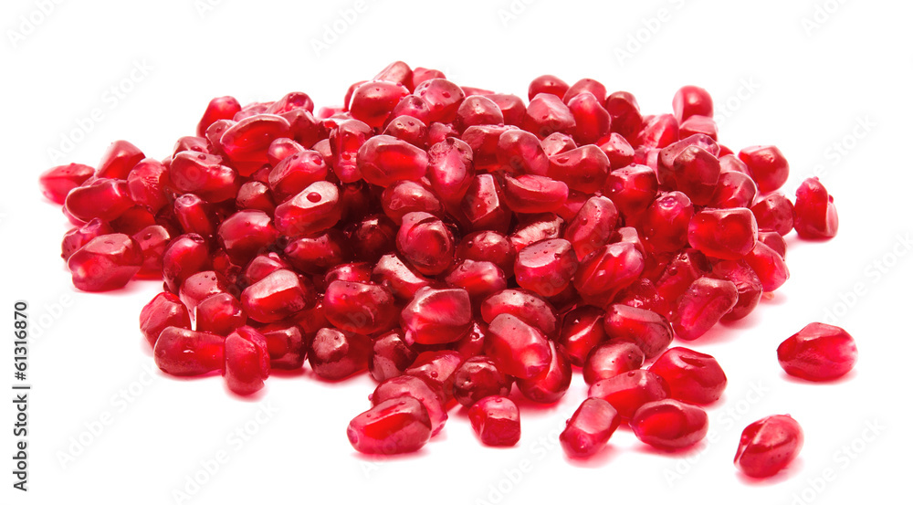 Heap of pomegranate seed isolated on white Heap of pomegranate seed isolated on white
