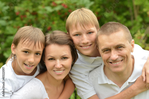 Happy family in summer park