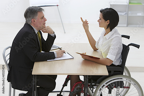 disables business woman in recruitment meeting photo