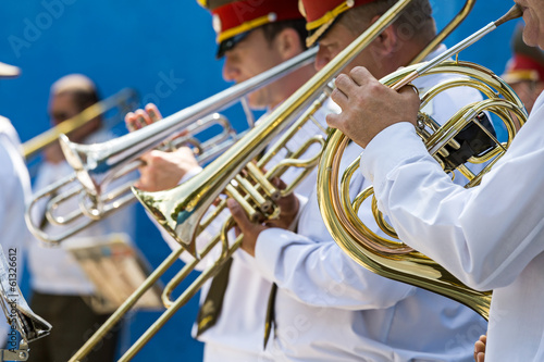 Brass band musicians with trumpets