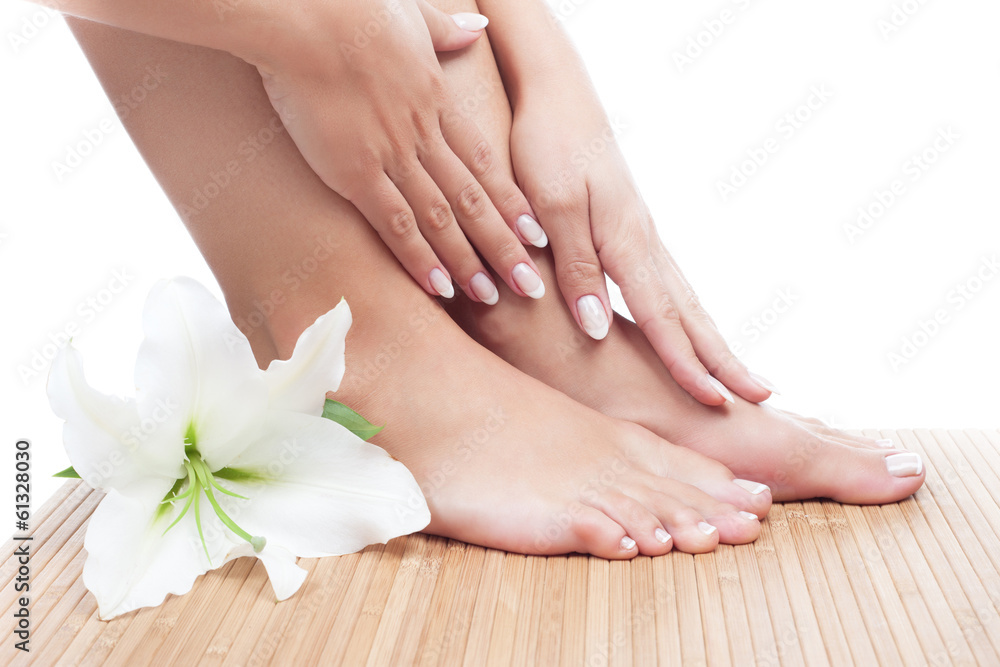 Fototapeta premium Beautiful woman's hands and legs