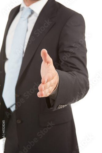 Detail of a business man with an open hand ready to seal a deal