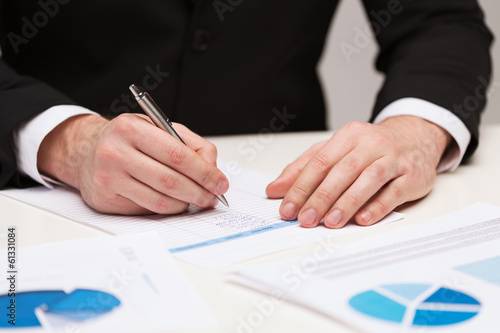 close up of businessman with papers