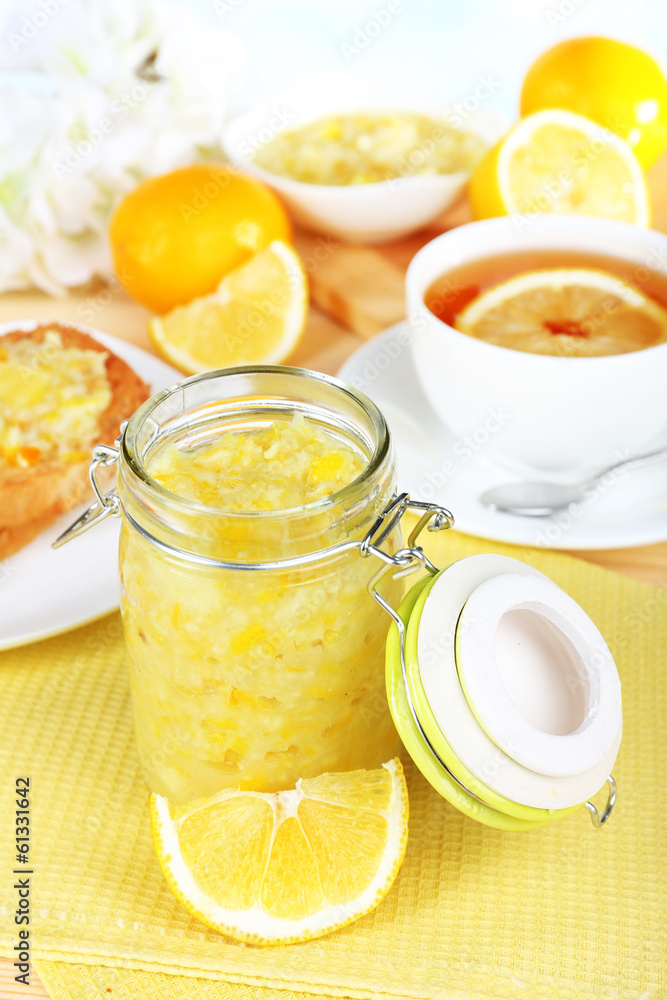 Tasty lemon jam on table close-up Tasty lemon jam on table close-up