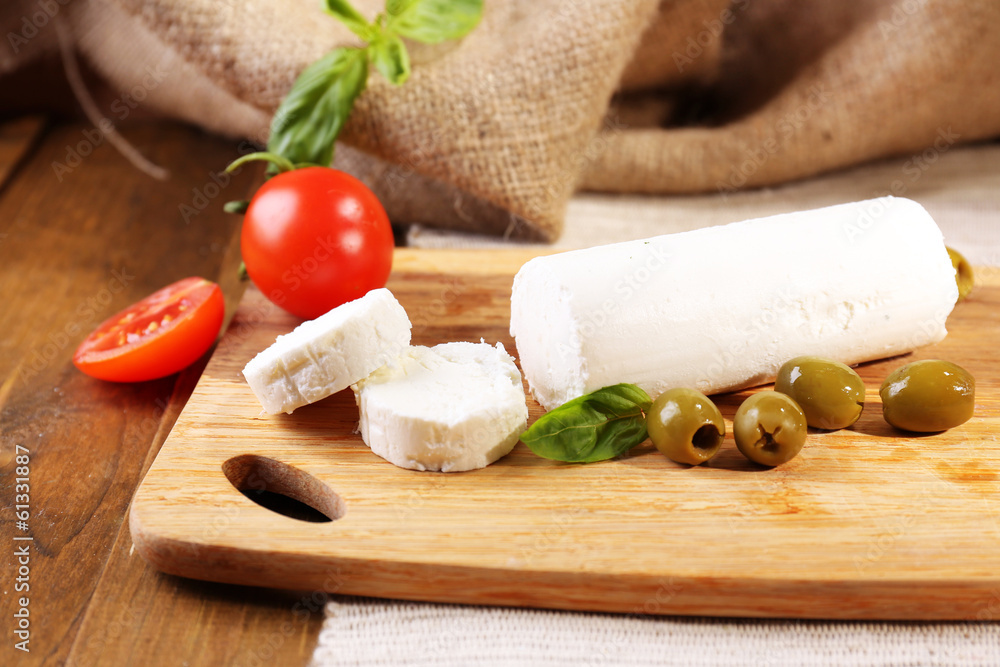 Tasty bushe cheese with tomatoes, olives and basil, Tasty bushe cheese with tomatoes, olives and basil,