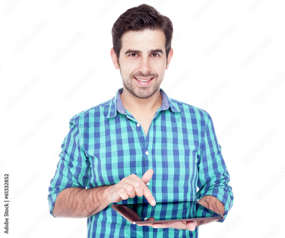 Handsome man using a tablet computer, isolated over a white back Handsome man using a tablet computer, isolated over a white back