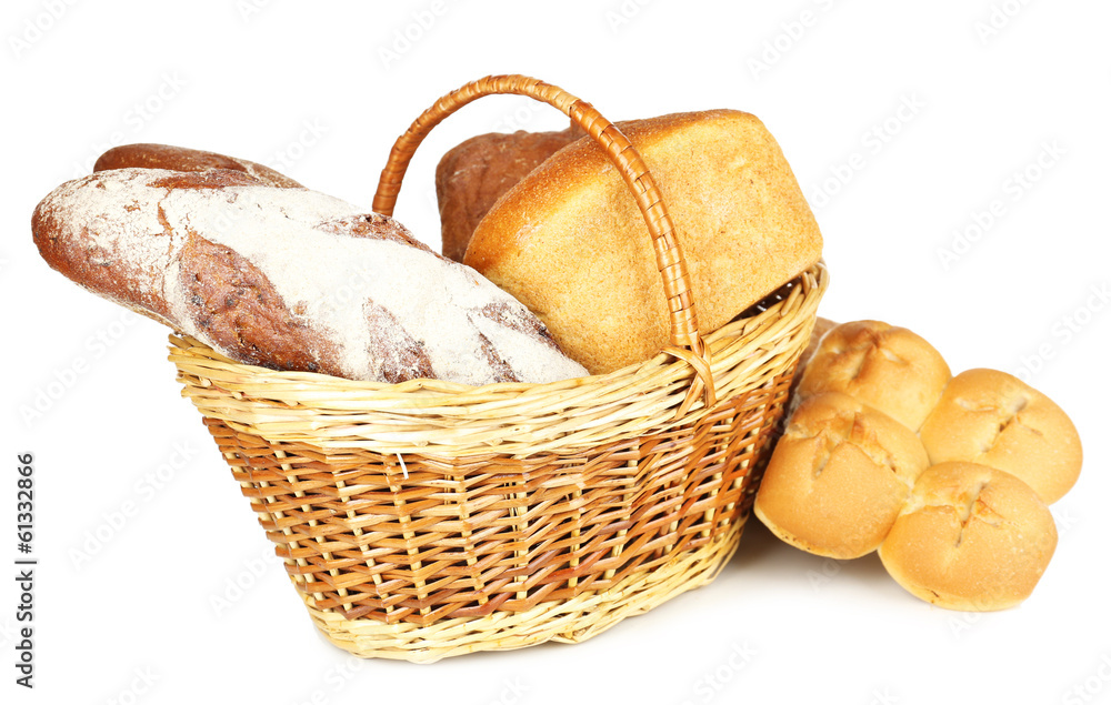 Composition with bread and rolls in wicker basket isolated Composition with bread and rolls in wicker basket isolated