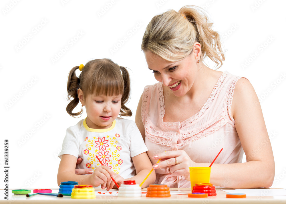 Mother and kid paint together Mother and kid paint together