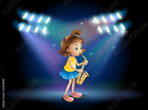 A young lady at the stage playing with her saxophone