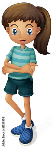 A young girl wearing a stripe-colored tshirt
