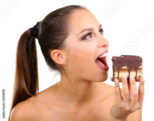Portrait of beautiful young girl with chocolate cupcake