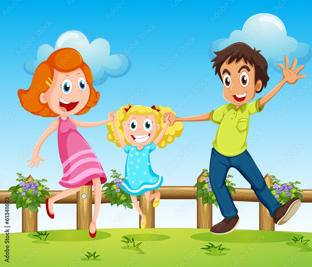 A happy family above the hills with a fence A happy family above the hills with a fence