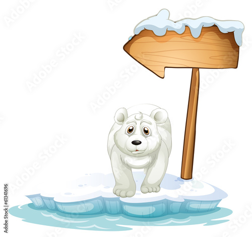 A polar bear below the wooden arrowboard