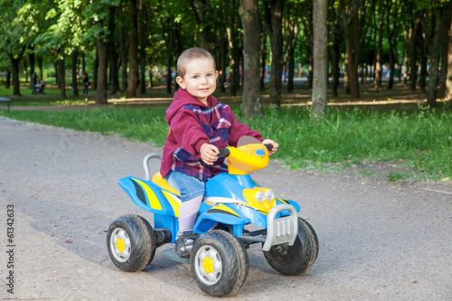 Boy driving the quad