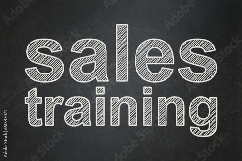 Advertising concept: Sales Training on chalkboard background