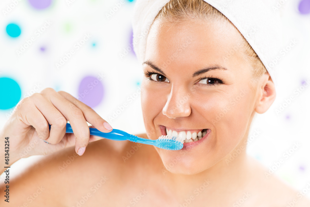 Portrait of Young woman brushing her teeth. Portrait of Young woman brushing her teeth.