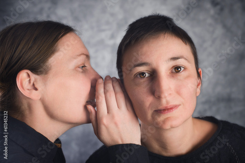 Fotografie Two women gossiping