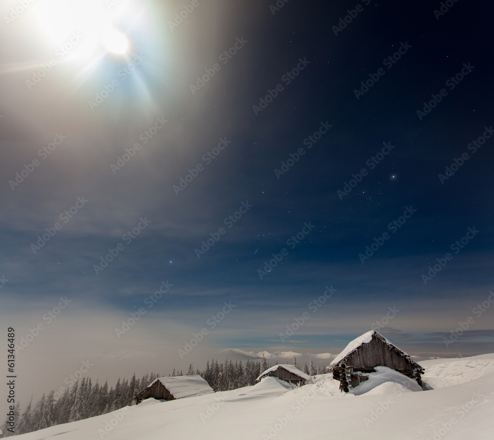 Beautiful winter landscape in the mountains to night with stars