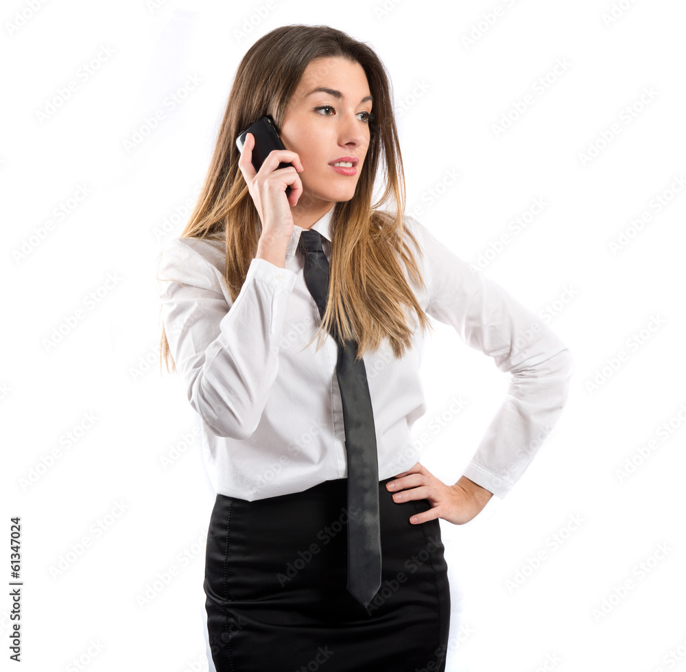 Young girl talking on mobile over white background Young girl talking on mobile over white background