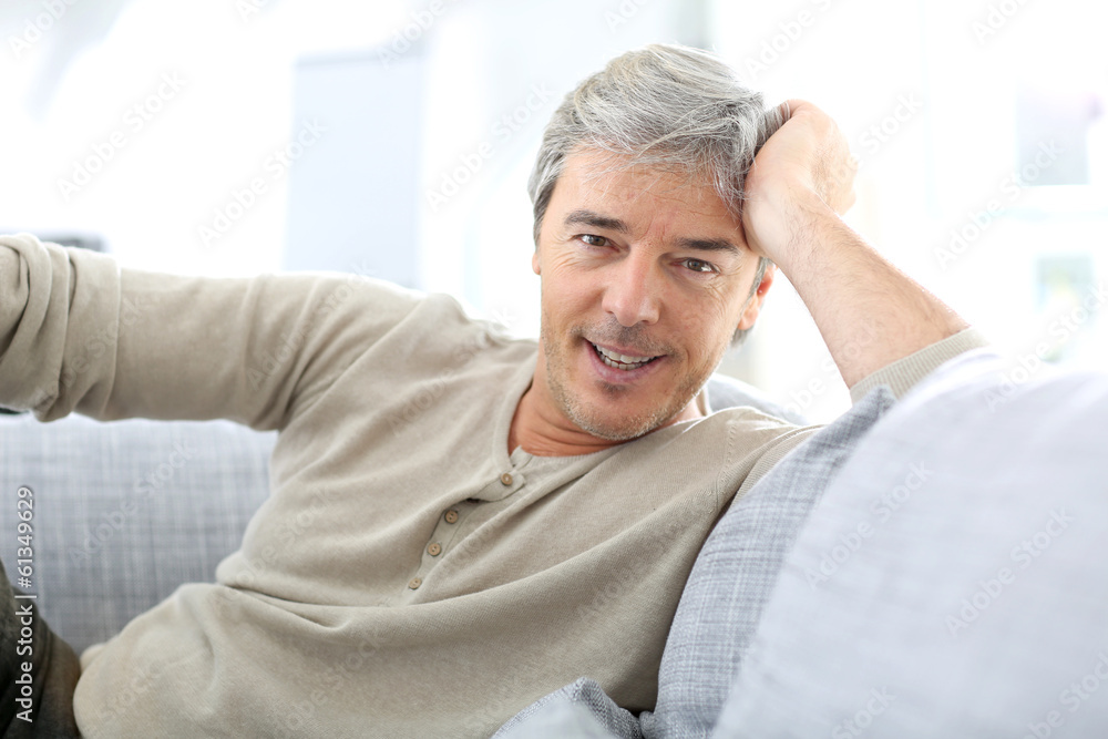 Portrait of attractive mature man relaxing at home Portrait of attractive mature man relaxing at home