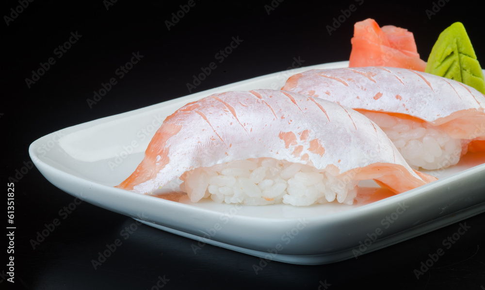 japanese cuisine. sushi salmon on the background japanese cuisine. sushi salmon on the background