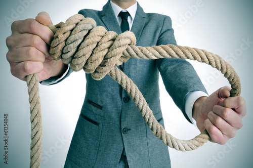 Bilde på lerret man in suit holding a rope with a hangmans noose