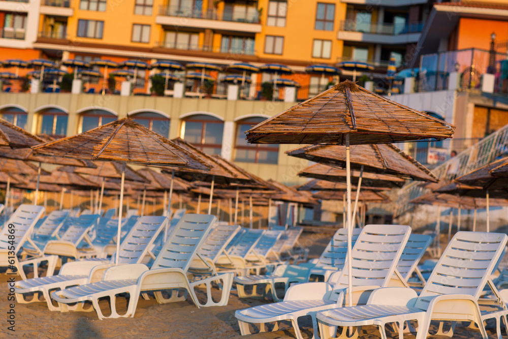Fototapeta premium Beautiful view of a resort beach with sunshades