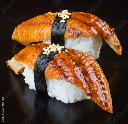 japanese cuisine. sushi unagi on the background photo