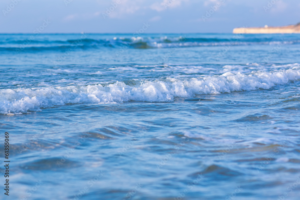 Fototapeta premium Soft wave of the sea on a sandy beach