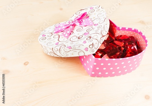 Fototapeta Naklejka Na Ścianę i Meble -  gift box with ribbon on wood table, concept of valentine day