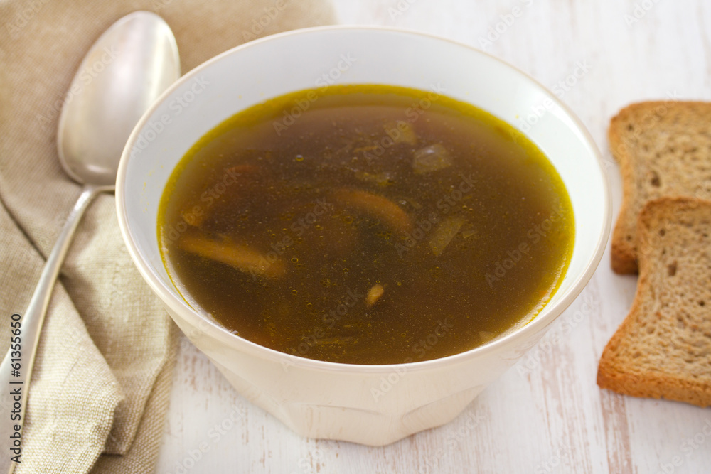 mushroom soup in bowl and spoon mushroom soup in bowl and spoon