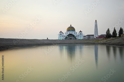 majestic floating mosque at malacca straits during sunset